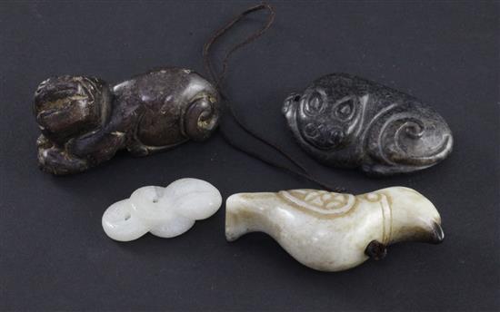 Four Chinese jade carvings, 19th/20th century or earlier, 5.2 and 5.5cm